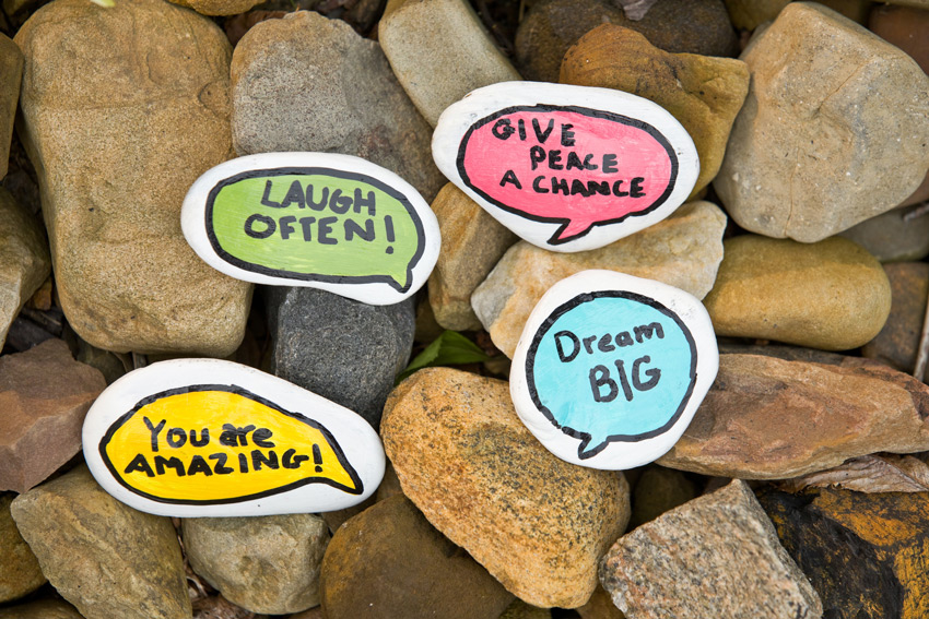 Painted rocks with acts of kindness painted on them