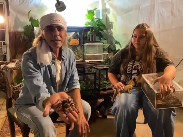 Rafael Yifrach holding a spider
